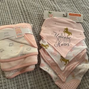 Rand new burp clothes and bibs.